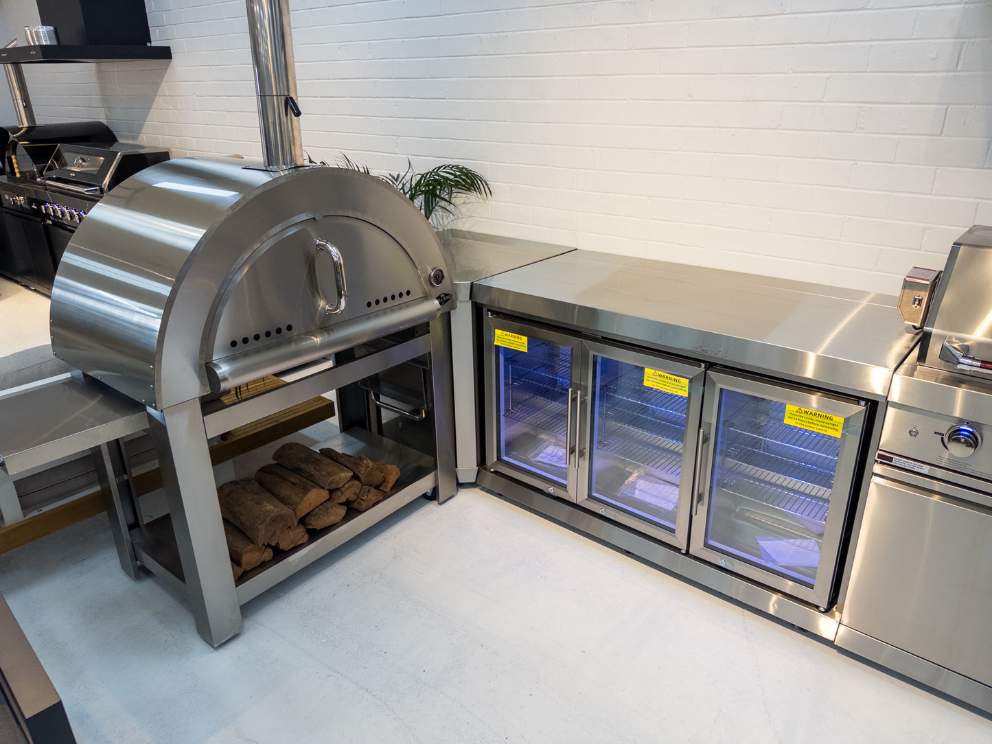 L Shape 304SS Hurricane BBQ Inc 3DR Fridge, 118L Fridge,30” Pizza Oven, 150CM 304SS Rangehood, Rotisserie & Covers